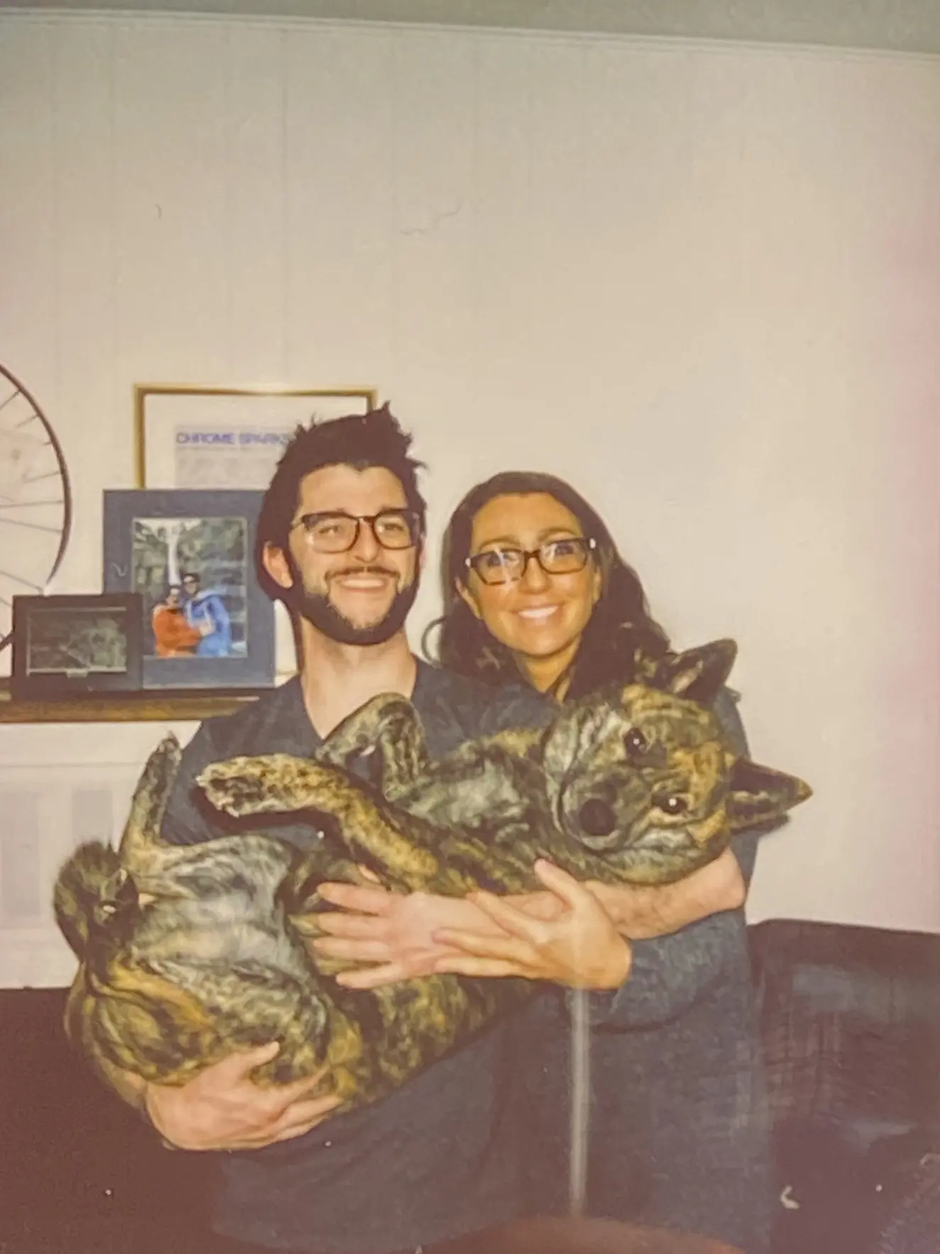 Blake holding Velo with Jessica standing by his side